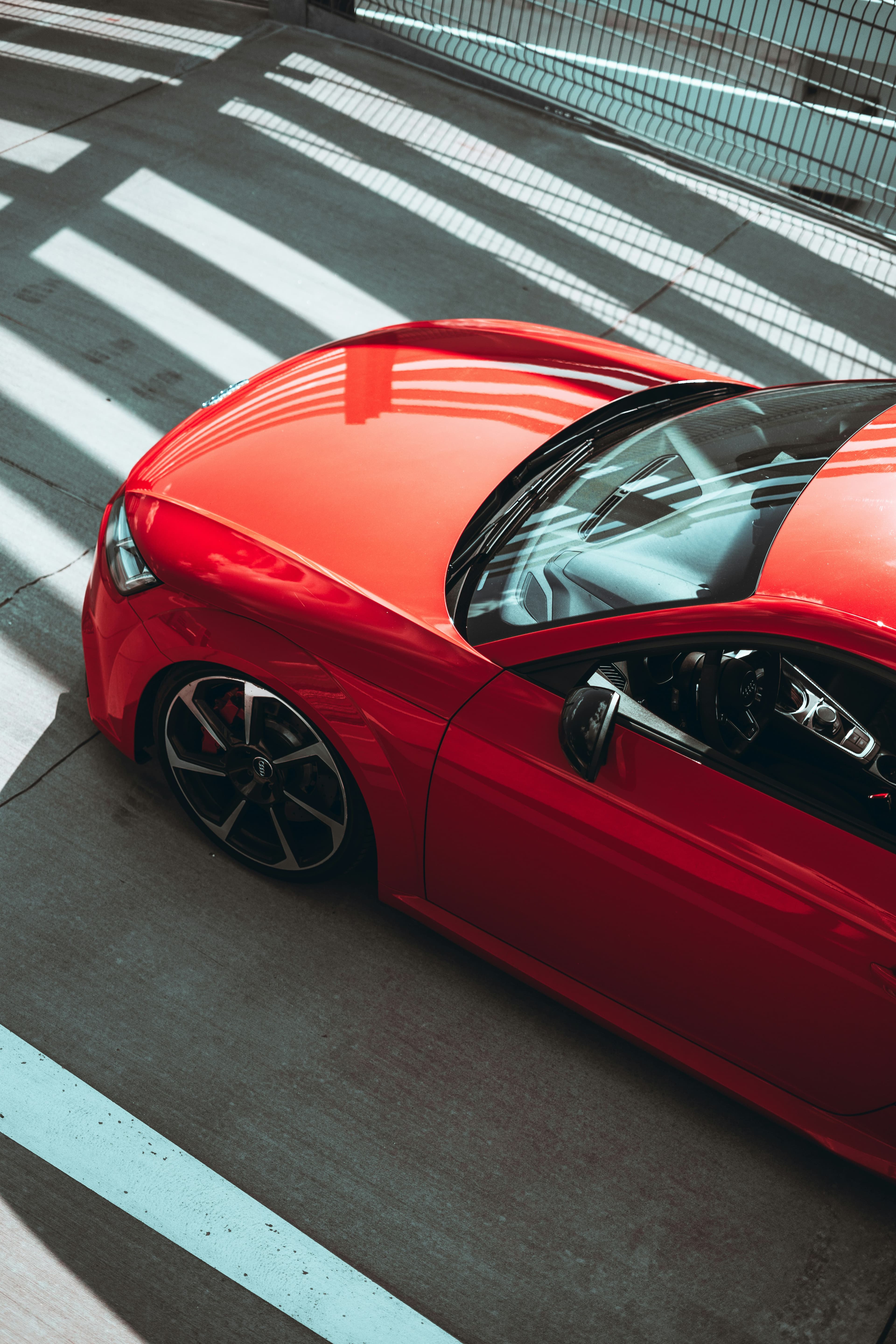Black BMW in dark garage